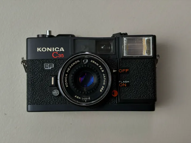 Konica C35 EF (Pikkari) — 35mm compact rangefinder-style with built-in flash from 1975